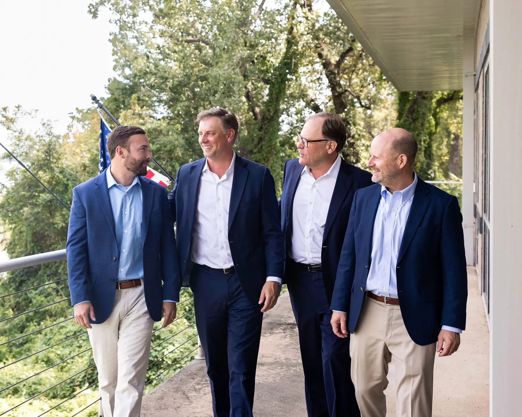 TMB's advisors on the balcony of their Little Rock office