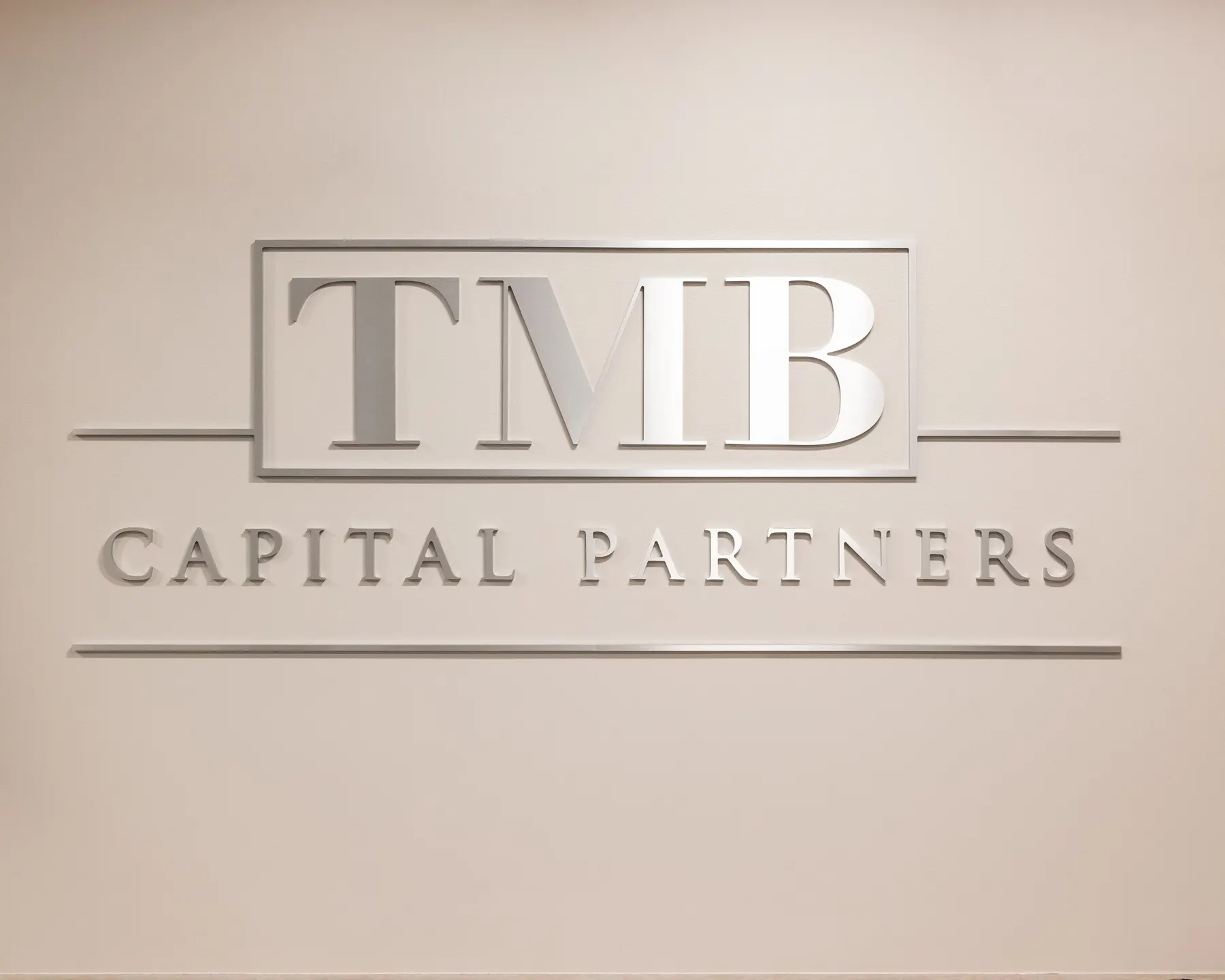 The TMB reception wall at the Cottondale Lane office