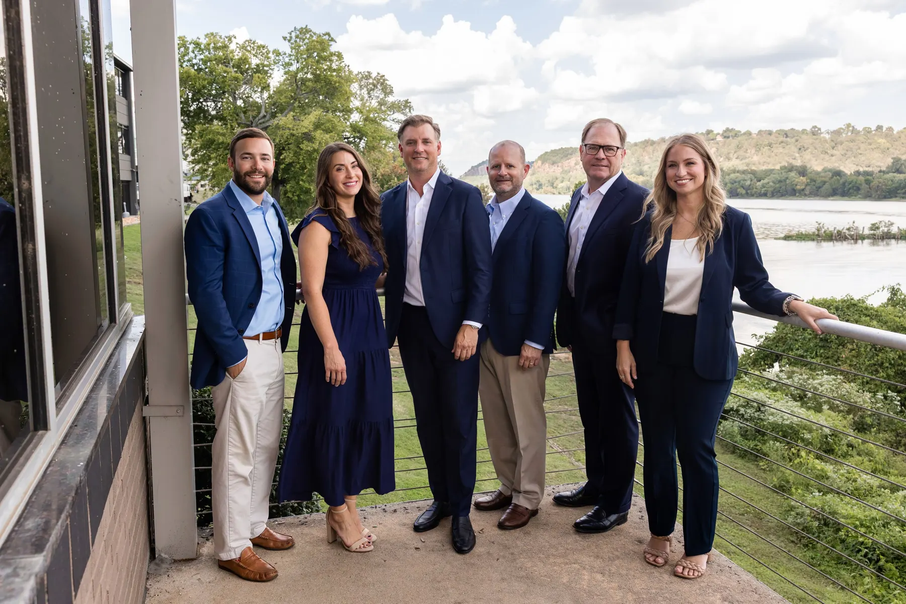 The TMB team on the deck of their Cottondale Lane office above the Arkansas River